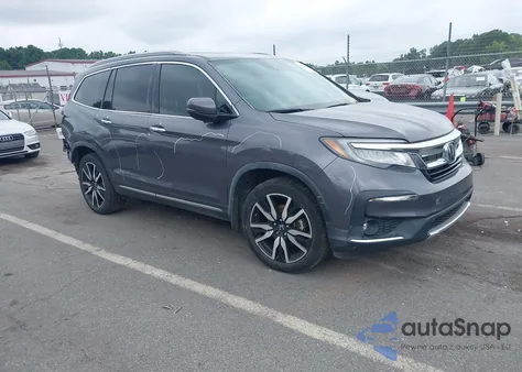2020 Honda Pilot 2Wd Touring 7 Passenger z USA, uszkodzony, nr VIN 5FNYF5H61LB011831